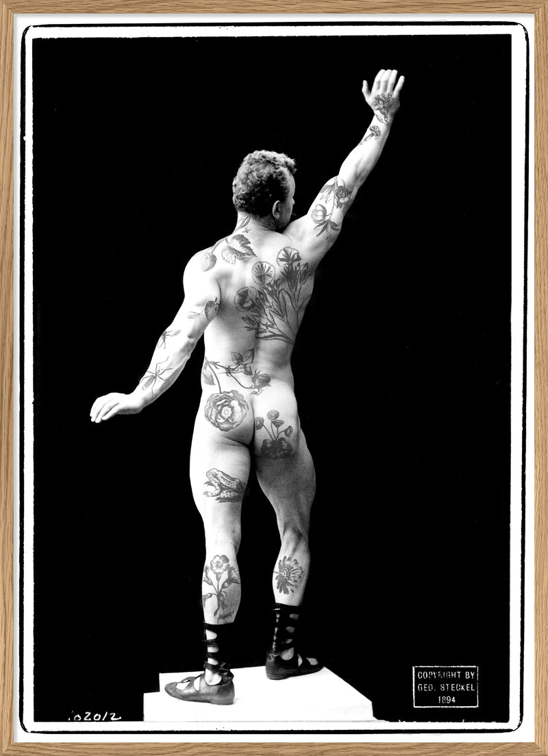 Tattooed guy left